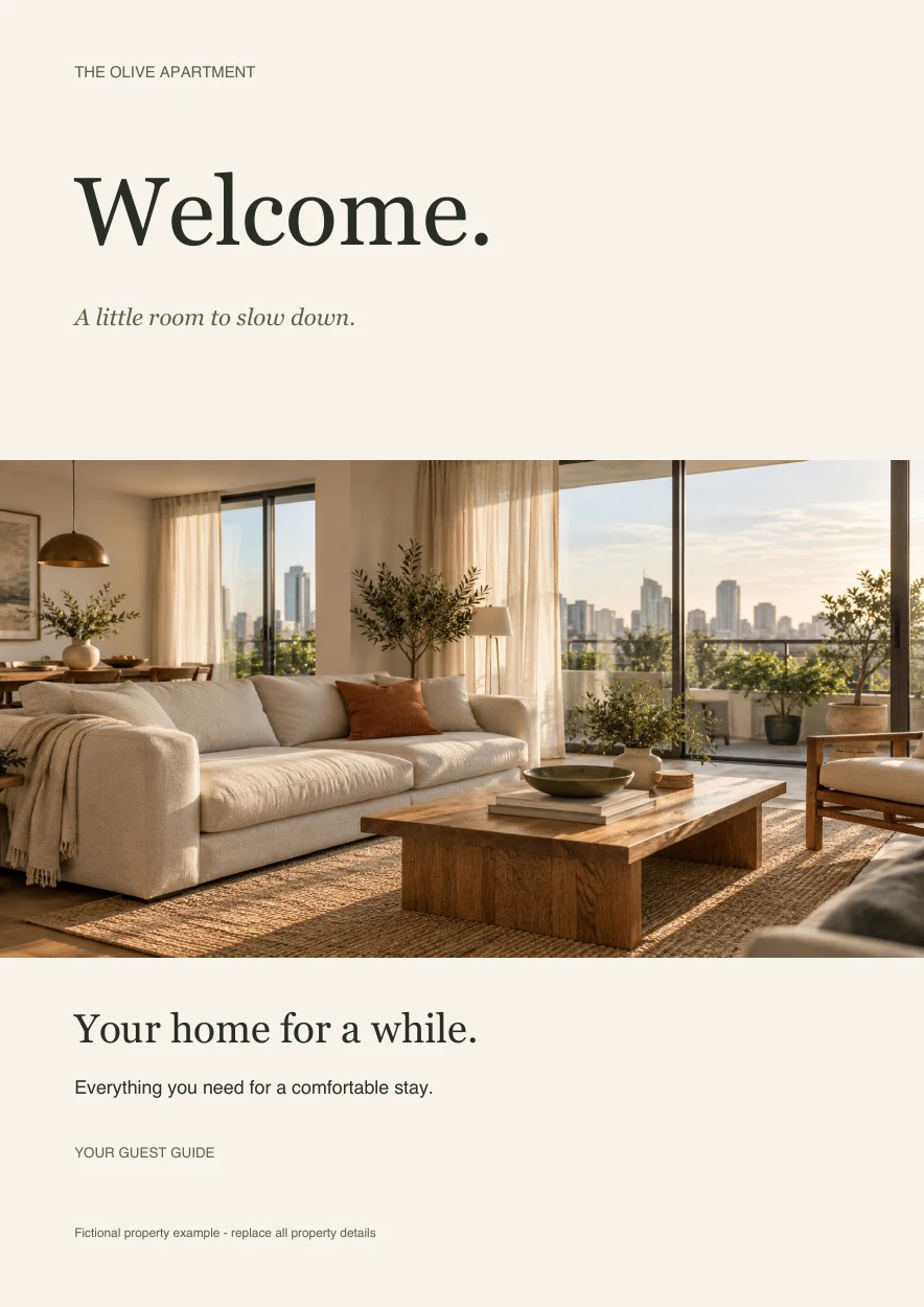 Actual First Guest welcome book cover with ivory paper, serif lettering and an illustrative apartment photograph